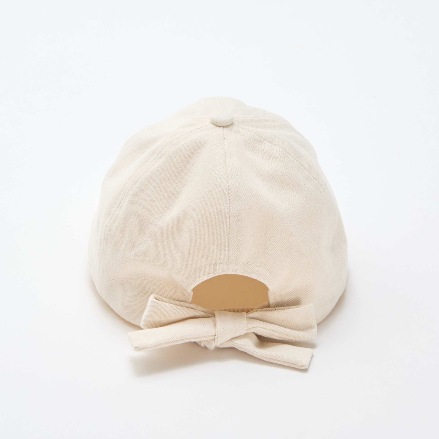 Cap with decorative bow at the back BEIGE