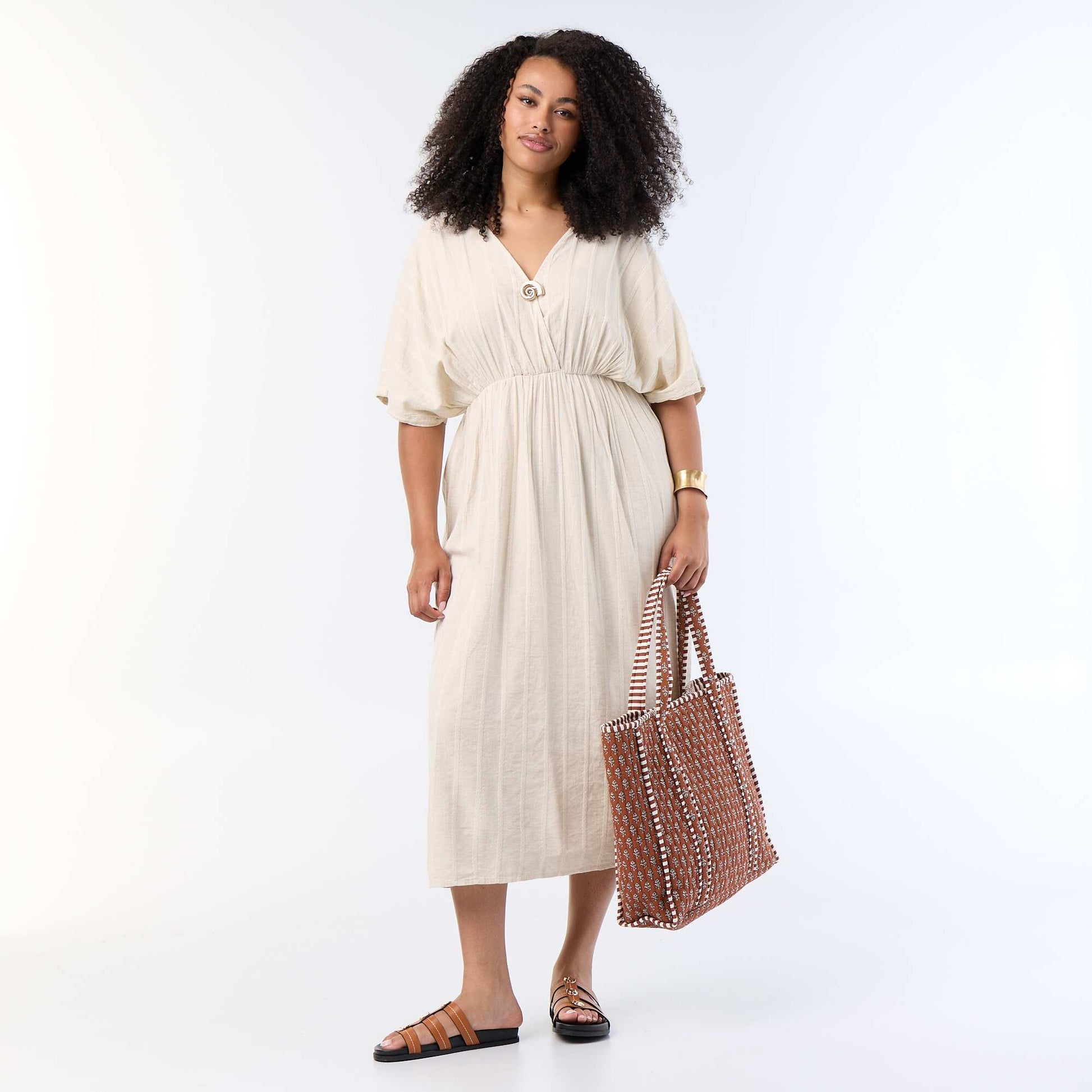 Long crossover-neck dress with decorative jewel BEIGE
