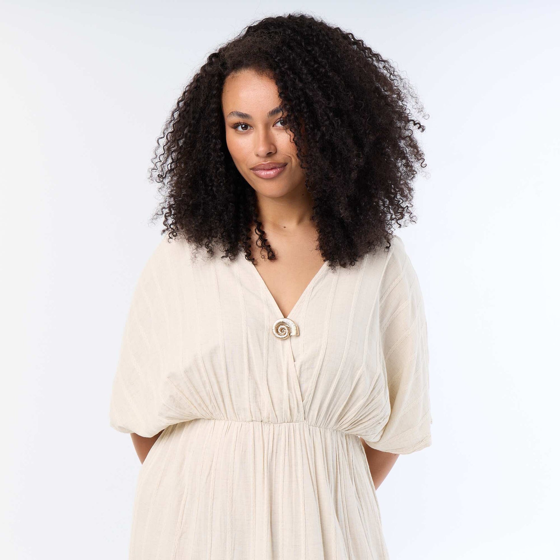 Long crossover-neck dress with decorative jewel BEIGE