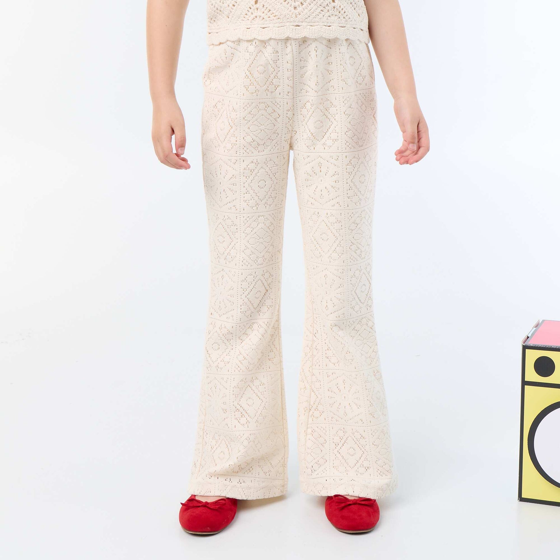 Crochet-look knit flare trousers BEIGE